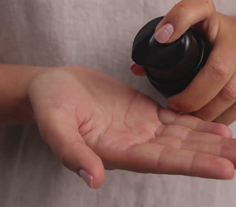 Skincare model is applying TriDration B to face